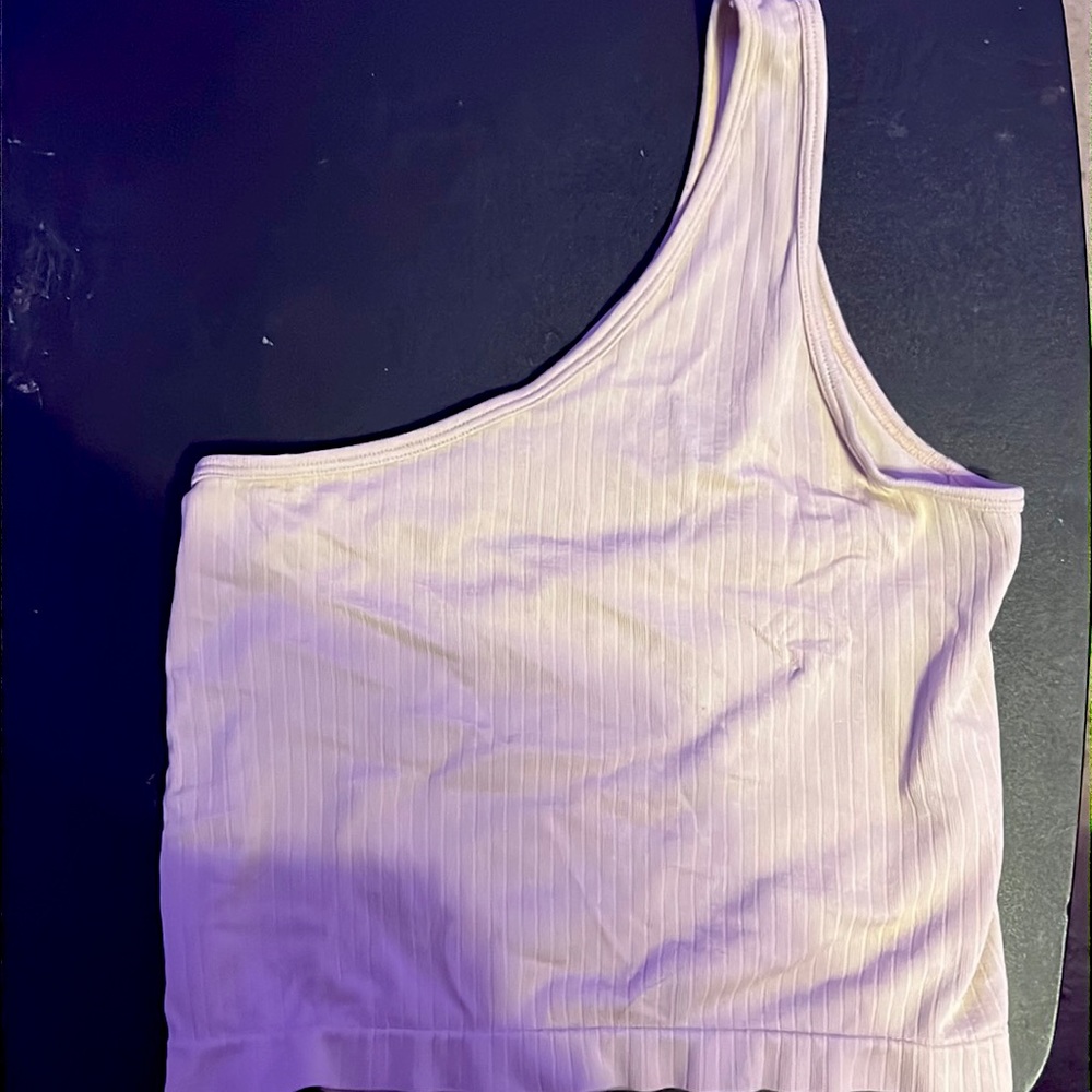 This is a one shoulder crop top with a opening in the back.